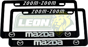PORTAPLACAS NEGRAS GRABADAS MAZDA LETRAS CROMADAS (JGO. c/2 pzas.)