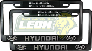 PORTAPLACAS NEGRAS GRABADAS HYUNDAI LETRAS CROMADAS (JGO. c/2 pzas.)