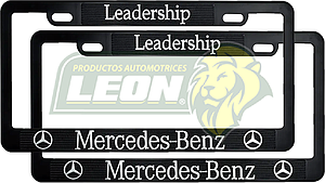 PORTAPLACAS NEGRAS GRABADAS MERCEDES BENZ LETRAS CROMADAS (JGO. c/2 pzas.)