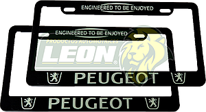 PORTAPLACAS NEGRAS GRABADAS PEUGEOT LETRAS FLUORESCENTES (JGO. c/2 pzas.)