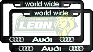 PORTAPLACAS NEGRAS GRABADAS AUDI LETRAS FLUORESCENTES (JGO. c/2 pzas.)